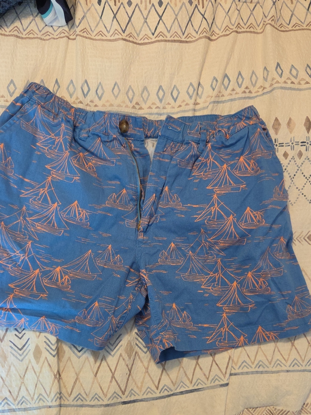 chubbies Blue Shorts with Orange Sailboat Print